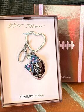 Betsey Johnson football keychain with iridescent bow and heart-shaped charm NWT